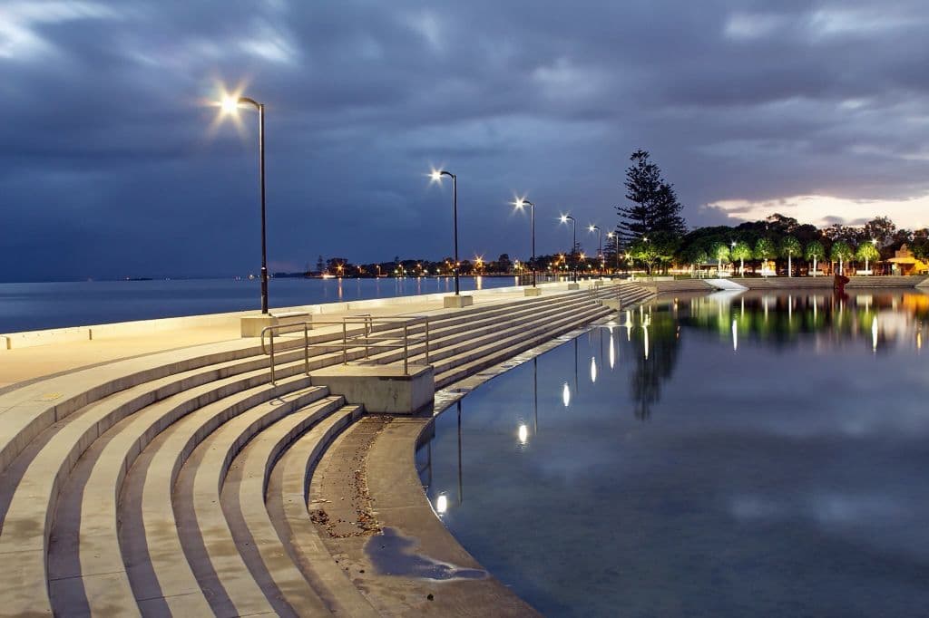 A Wynnum bayside home with a coastal style roller door overlooking Moreton Bay